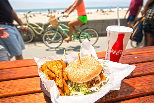 Beach burger, fries and coca-cola stock photo