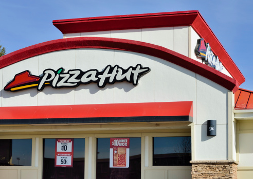 Santa Fe, New Mexico, USA - March 18, 2013: A Pizza Hut location in Santa Fe. Pizza Hut is an international chain of restaurants and a subsidiary of Yum! Brands, Inc..