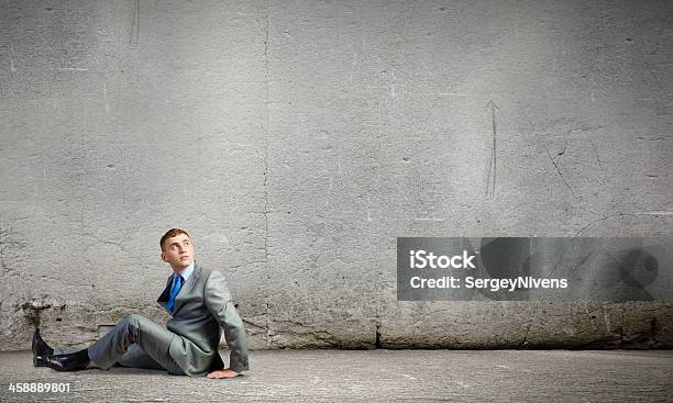 Sitting Businessman Stock Photo - Download Image Now - Adult, Bank Teller, Business