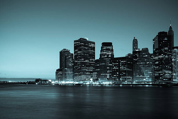 istock New York - view  of Manhattan Skyline by night 458889829
