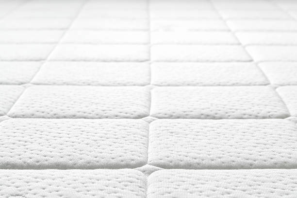 istock Close-up of white mattress texture. 458890177
