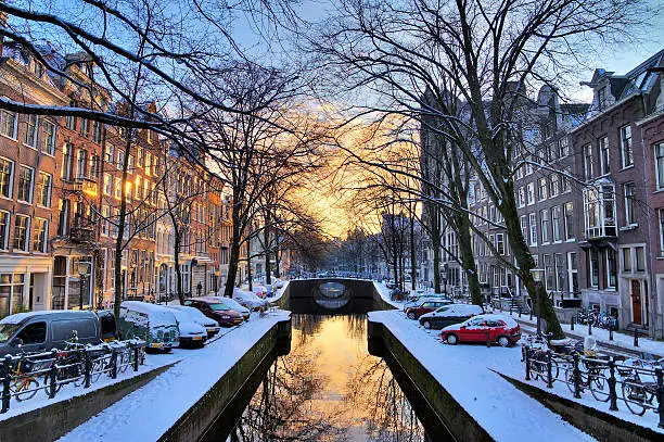 Photo of Amsterdam sunrise canal