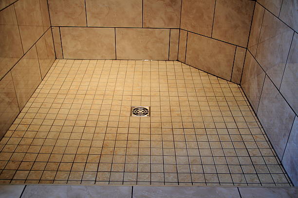 Tile Shower floor and drain stock photo