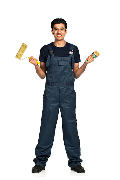 istock Repairman Arab nationality in the construction overalls on a white 458892177