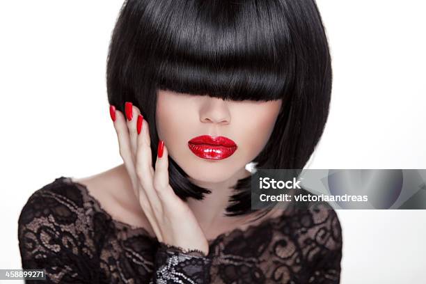 Beautiful Brunette Woman With Hairstyle And Red Lips Manicured Stock Photo - Download Image Now
