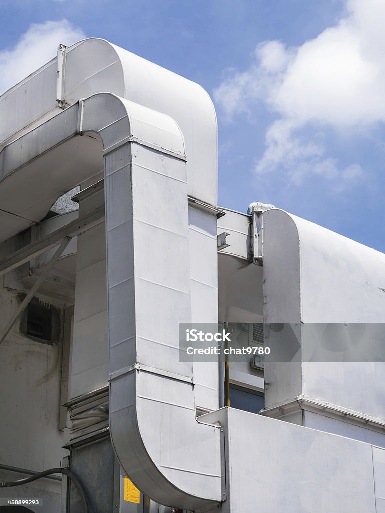 Air ventilation duct Air ventilation duct outside the building in the bright sky Air Duct Stock Photo