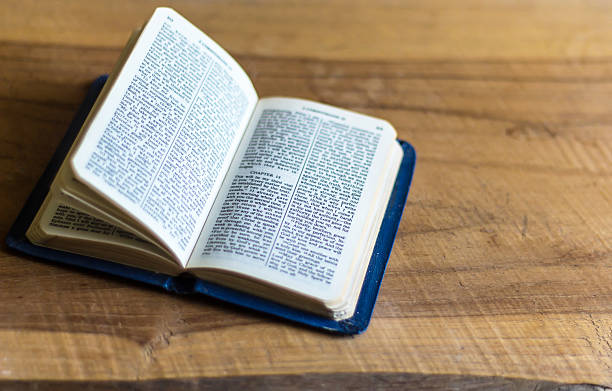 istock Bible on the wooden table 458899371
