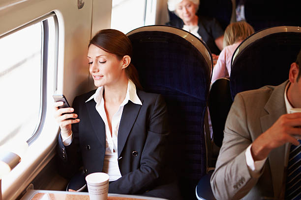 istock A businesswoman checking her mobile phone while commuting 458905835