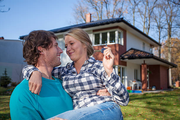 istock Couple moving into a new house 458909661