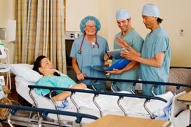 istock Health team laughing with patient 458909895