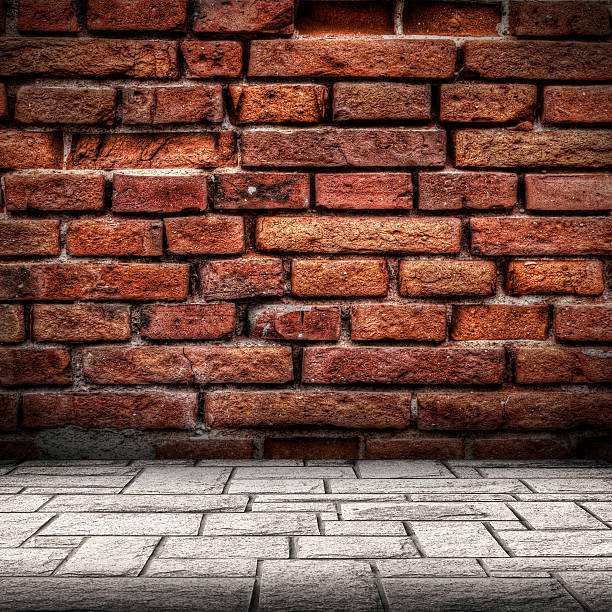 Red brick wall and floor interior stock photo