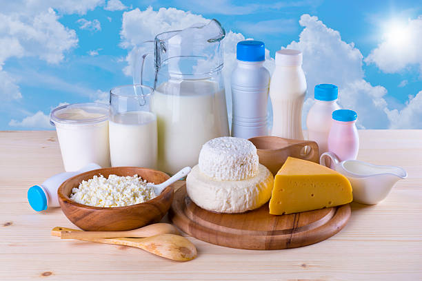istock Composition of dairy products on sky background 458915769