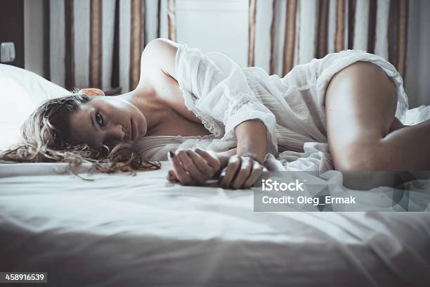 Young Sexy Woman Laying In Bed Stock Photo - Download Image Now - Sexual Issues, Sex and Reproduction, Women
