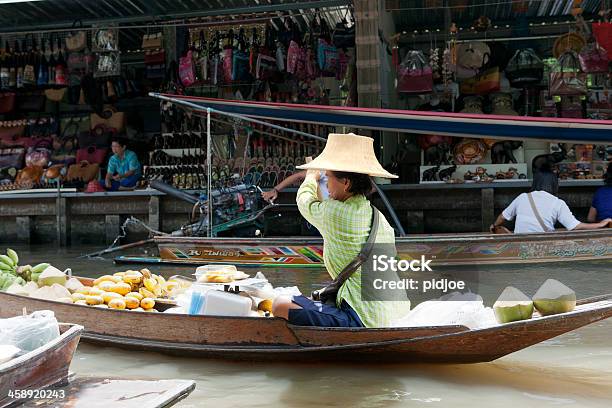Vendor At Damnoen Saduak Floating Market Thailand Stock Photo - Download Image Now - Adult, Adults Only, Asia