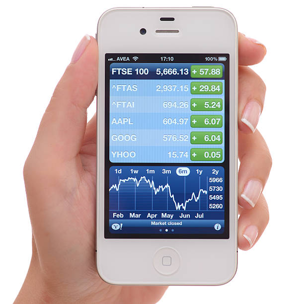 yahoo finanças no iphone 4 - iphone trading stock market finance - fotografias e filmes do acervo