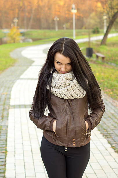 istock Young pretty woman standing on alley 458923131