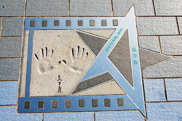 Hongkong, China - August 30, 2008: Walk Of Fame Star - director John Woo. John has directed many notable action films, like A Better Tomorrow and his Hollywood films include Mission Impossible 2.