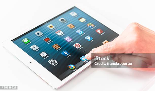Human Hand Touching The Mail Icon On Ipad Mini Stock Photo - Download Image Now - Aiming, Apple Computers, Big Tech