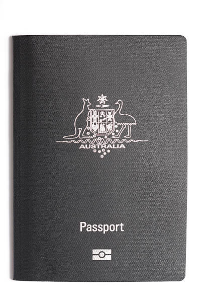 Australian Passport "Lismore, NSW, Australia - February 28, 2012: New Australian electronic e-passport isolated on a white background" coat of arms photos stock pictures, royalty-free photos & images