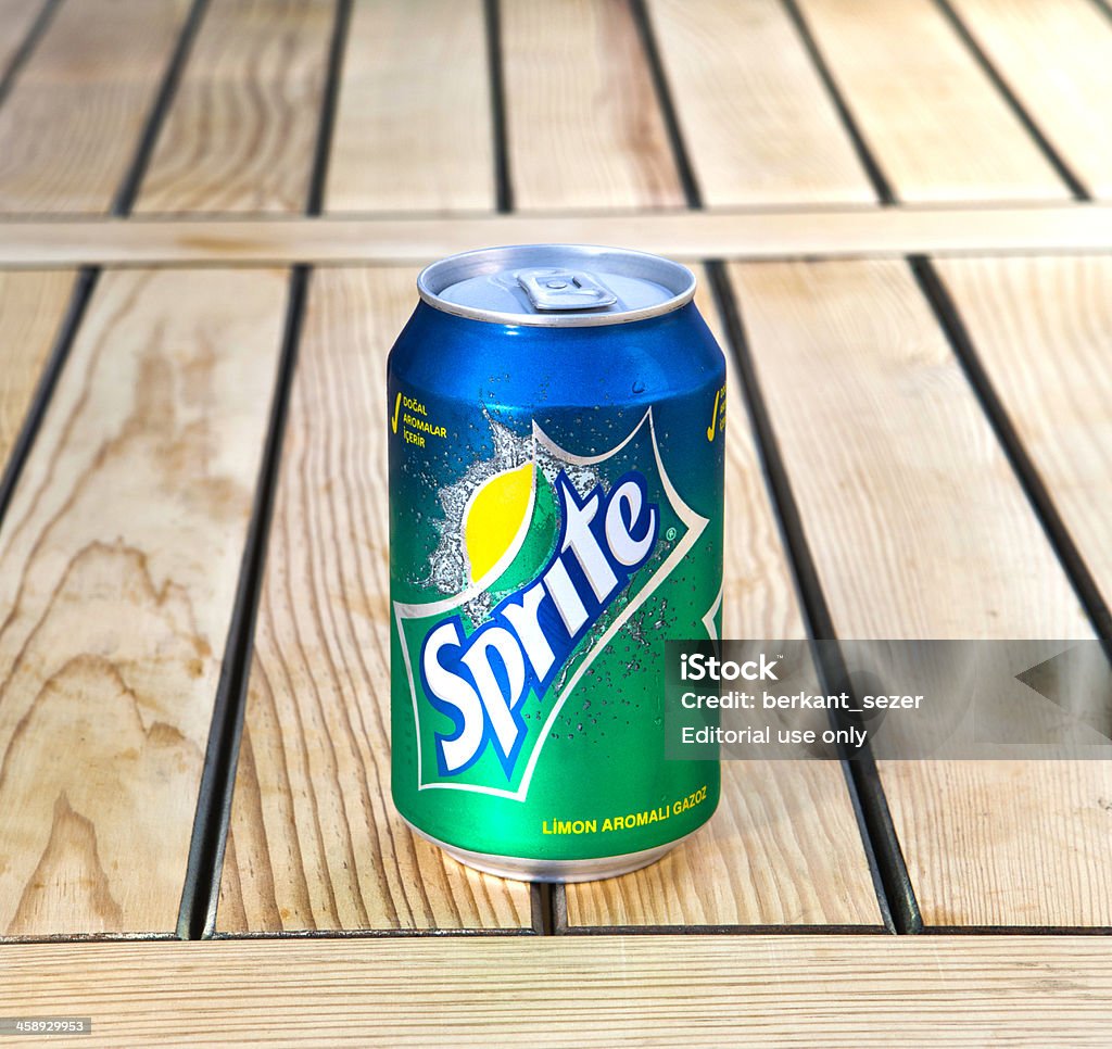 Sprite "Izmir, Turkey - September 18, 2012: 330ml Sprite can wooden floor. Sprite is made by the Coca-Cola Company" Cafe Stock Photo