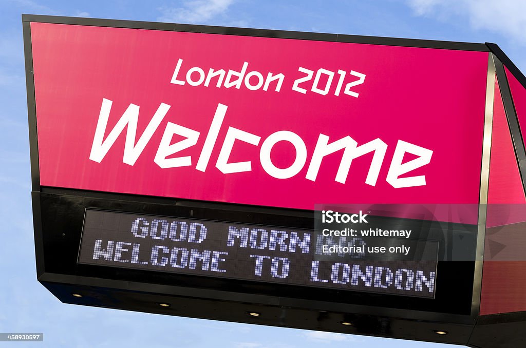 Welcome to London 2012 - sign "London, England - September 4, 2012: A bright Welcome sign at the entrance to the Olympic Park in Stratford, East London. There were several of similar signs in a row, each flashing a message along the bottom of the sign." 2012 Summer Olympics - London Stock Photo