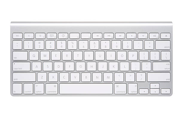 Apple Wireless Keyboard "Seoul, Korea - May 31, 2012: The completely cable-free Apple Wireless Keyboard uses Bluetooth technology to connect with your Mac or iPad." apple keyboard stock pictures, royalty-free photos & images
