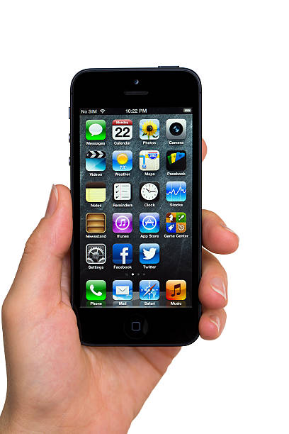 apple iphone 5 - iphone human hand iphone 5 smart phone стоковые фото и изображения