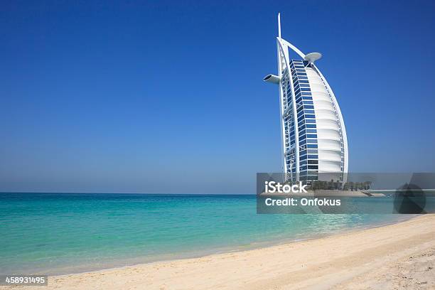 Burj Al Arab Hotel With Clear Blue Sky Dubai Uae Stock Photo - Download Image Now - Dubai, Burj Al Arab Hotel, Palm Tree