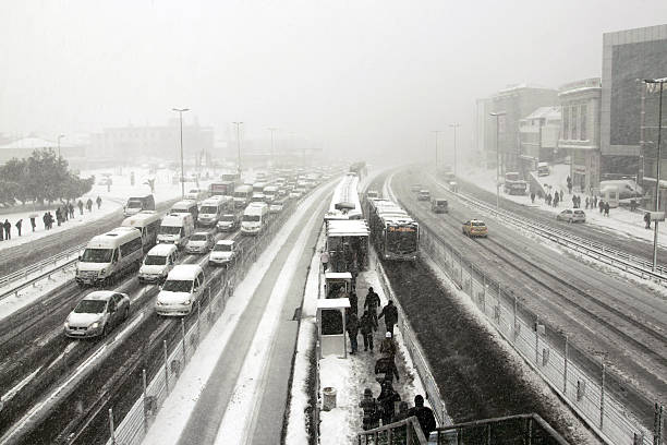 highway in winter "Istanbul,Turkey - February 1, 2012:  Busy traffic scene in Europan side of Istanbul from florya district.Traffic jam in the city of Istanbul in winter." boulevard photos stock pictures, royalty-free photos & images