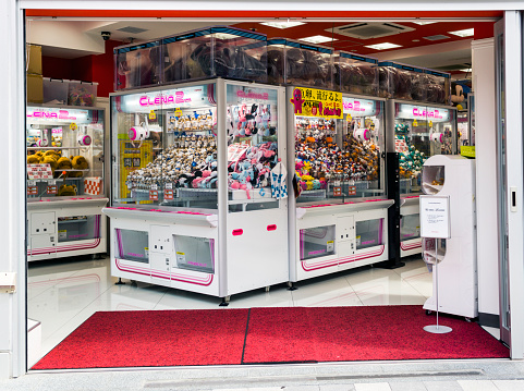 Tokyo, Japan - October 9, 2012: Amusement arcade in Akihabara Tokyo. This district is a major shopping centre for electronic, computer, anime and otaku merchandise with a strong second hand market. It is also very popular for the amusement arcades like the one of the image.