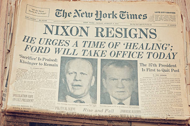 Newspaper front page showing resignation of Nixon "New York, New York, USA - November 3, 2012: A close up of the front page of the The New York Times newspaper dated August 9, 1974. The New York Times reporting President Richard Nixon resigns after the Watergate scandal, Vice President Gerald Ford taking office." richard nixon stock pictures, royalty-free photos & images