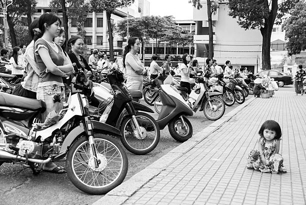 Huge traffic of motorcycles in a busy avenue in Hanoi, Vietnam.