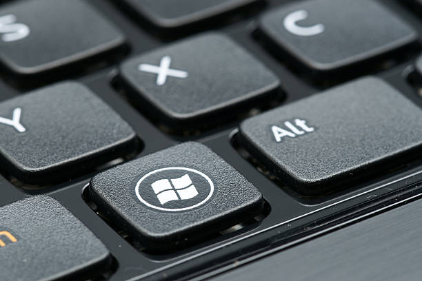 Windows sign on keyboard "Celje, Slovenia - October 4, 2012: Windows logo on laptop keyboard button. Windows is a best known product of Microsoft Corporation. Operating systems Windows is installed on 90Aaa of all personal computers in the world" microsoft stock pictures, royalty-free photos & images