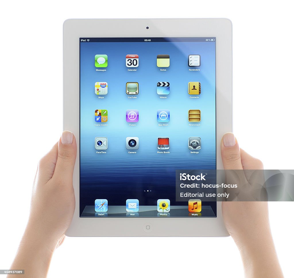 Gospodarstwa iPad 3 - Zbiór zdjęć royalty-free (Aparat fotograficzny)