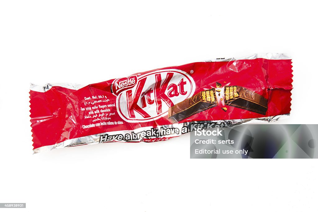 Empty and crumpled Kit Kat "Istanbul, Turkey - January 26, 2012: Empty crumpled pack of Nestle Kit Kat candy bar, isolated on white background. NestlA S.A. is the world's largest food and nutrition company." Wrapping Paper Stock Photo
