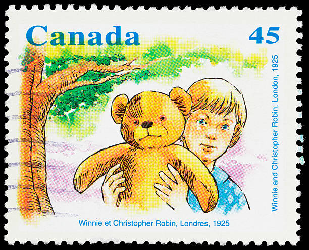 Canada Winnie the Pooh (1925) postage stamp "Sacramento, California, USA - March 28, 2012: A 1996 Canada postage stamp depicting Winnie the Pooh and Christopher Robin. The illustration represent's their appearance in Pooh's debut, a short story by A. A. Milne published on December 24, 1925 in London's The Evening News." winnie the pooh photos stock pictures, royalty-free photos & images