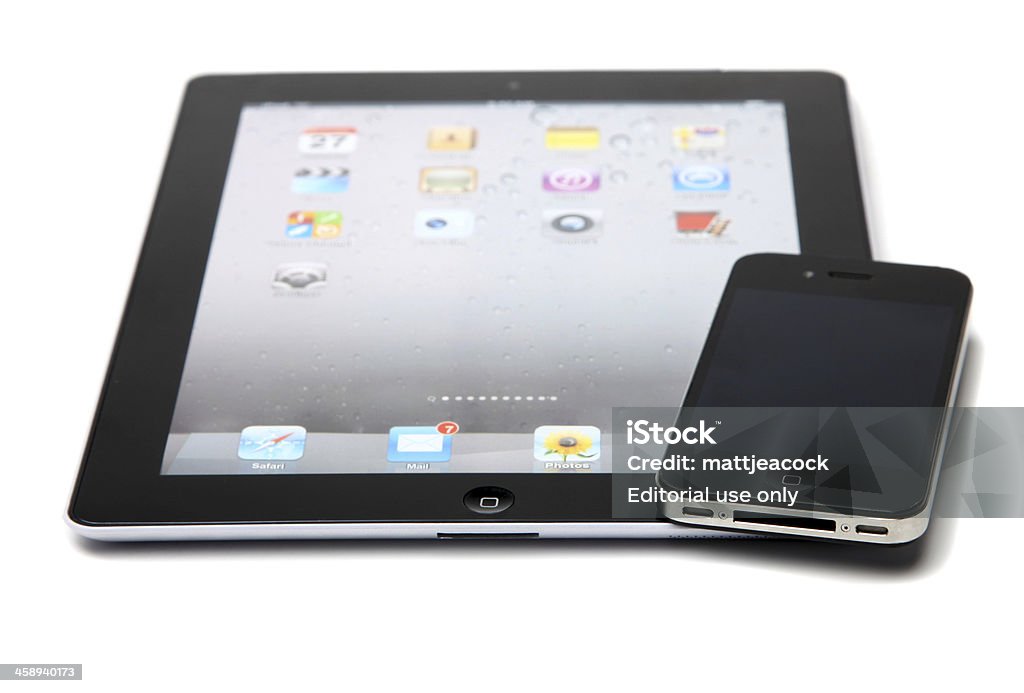 Apple iPad e iPhone - Foto de stock de Apple computers royalty-free