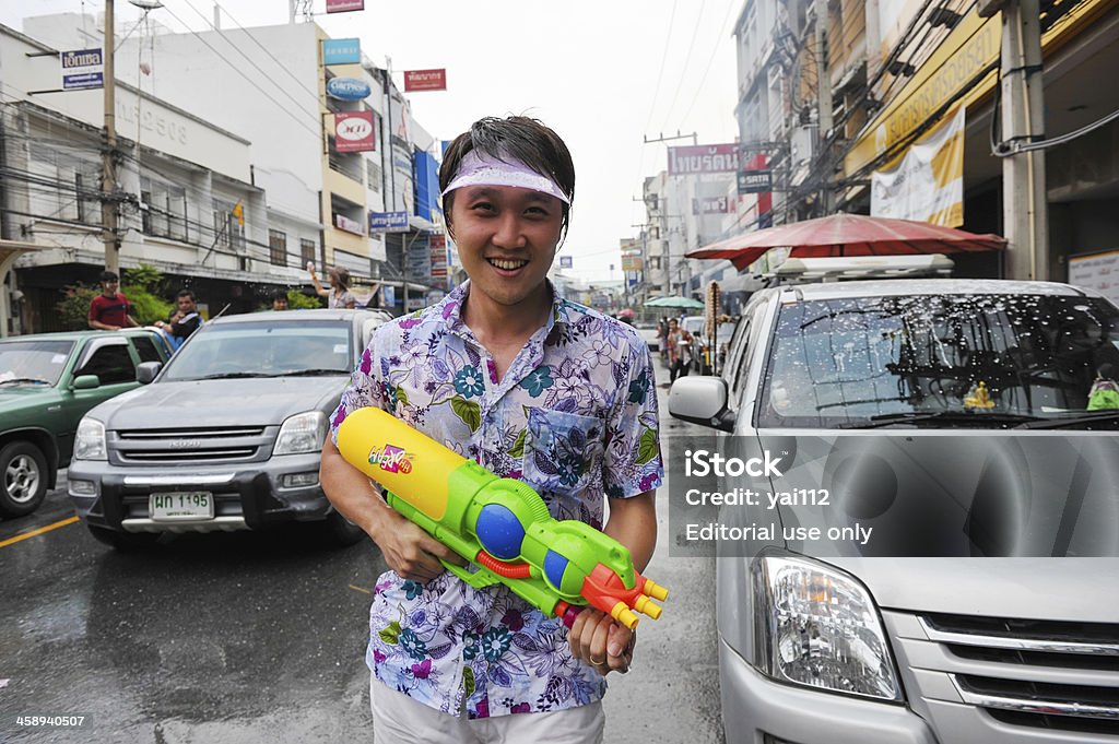 Hombre Pistola de agua - Foto de stock de Adolescente libre de derechos