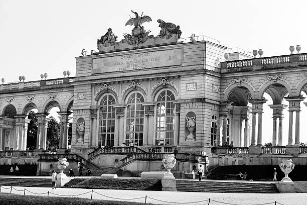 Vienna, Austria-July 8,2025 ,Photo shows the entrance of the Hofburg palace. Tourists and carriages at the gate of the building.