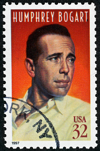 Humphrey Bogart Stamp "Richmond, Virginia, USA - December 4th, 2012:  Cancelled Stamp From The United States Commemorating The American Actor, Humphrey Bogart." humphrey bogart stock pictures, royalty-free photos & images