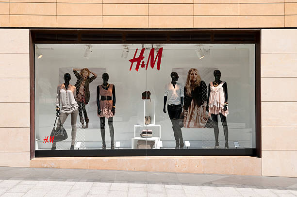 H&M display window in Beirut, Lebanon Beirut, Lebanon - September 19, 2010: A sidewalk display window at an H&M store in downtown Beirut. H&M has some 2500 stores worldwide. h and m stock pictures, royalty-free photos & images