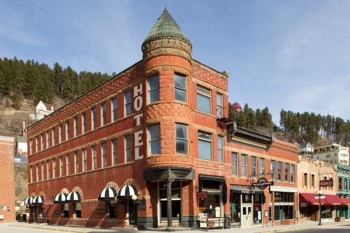 Deadwood, South Dakota, United States - March 9, 2012. Fairmont Hotel on the corner of Wall St. and Main St. in Deadwood, South Dakota. The hotel was originally known as the Mansion House and over the years has seen quite a seedy history.