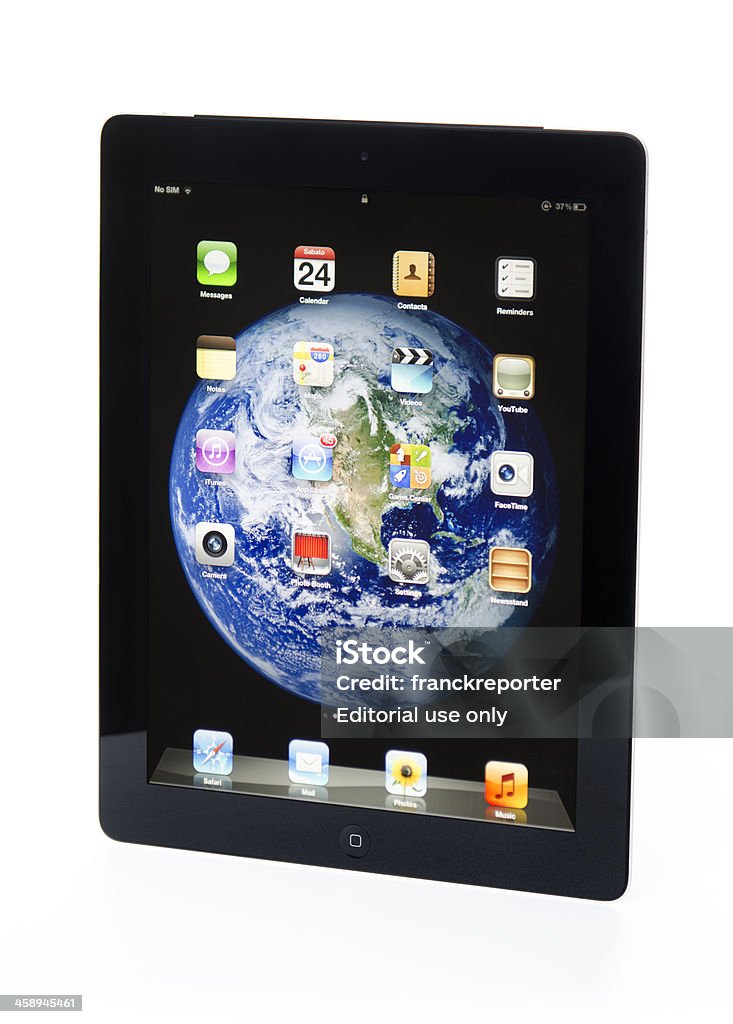 El nuevo Apple Ipad 3 negros reflexionando sobre una mesa - Foto de stock de Aparato de telecomunicación libre de derechos