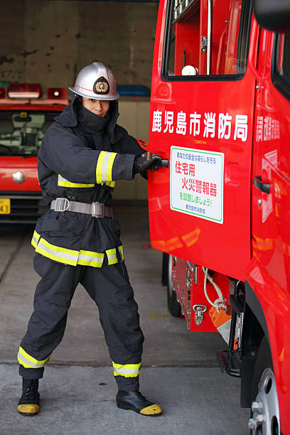 Fireman near a truck stock photo