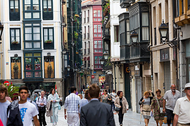 Bilbao's Casco Viejo "Bilbao, Spain - September 5, 2012: People walking during the day in the pedestrian zone of Bilbao's Casco Viejo (Old Town), a conservation area which is the historical heart of Bilbao." Casco stock pictures, royalty-free photos & images