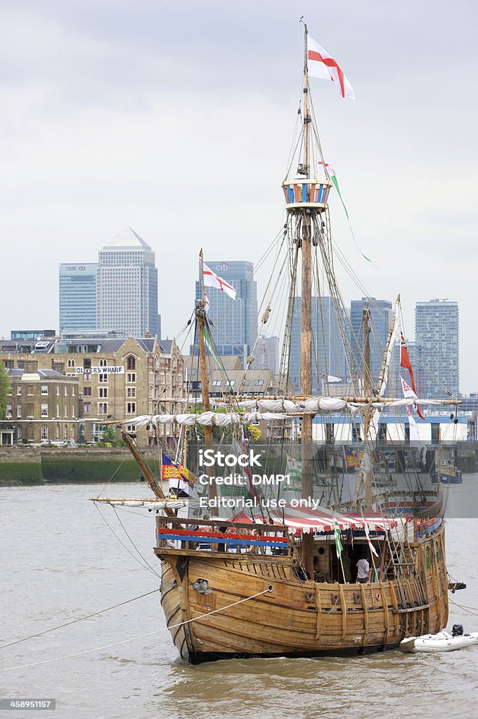 Ship The Matthew on River Thames, Canary Wharf in background "London, United Kingdom - June, 1st 2012: The Matthew, one of the ships forming the Avenue of Sail,  moored in readiness for the Thames Diamond Jubilee River Pageant with Canary Wharf in the background." 2012 Stock Photo