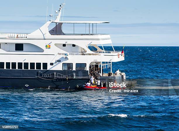 Divers In Inflatable Boat On Isabela Island Galapagos Stock Photo - Download Image Now