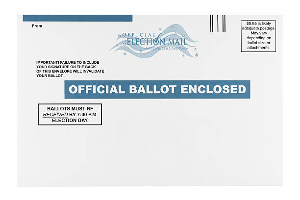 Mail-in Ballot "Colorado Springs, Colorado, USA - September 18, 2012: An official US mail-in ballot envelope shot in the studio and isolated on a white background. Mail-in ballots enable a person to vote through the mail instead of in person at a polling place." absentee ballot photos stock pictures, royalty-free photos & images
