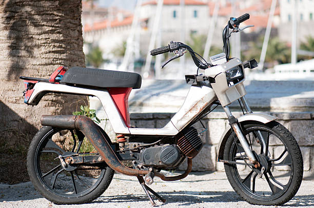 Kyiv, Ukraine - September 27 2025: old retro motor scooter moped parked on street