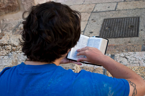 Reading the Bible stock photo